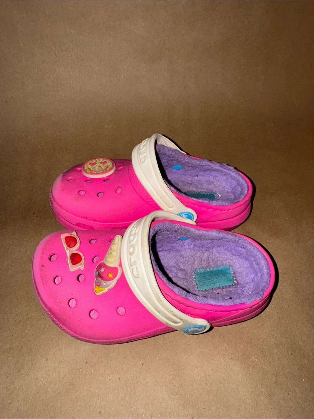 CROCS pink kids clogs with purple fleece lining and white straps